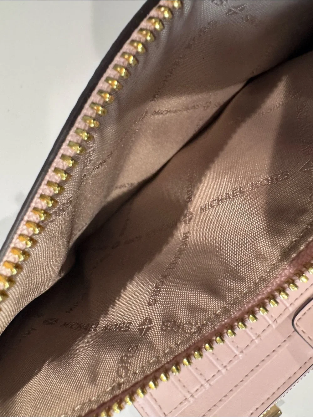Michael Kors Brown Signature Wristlet with Pink Trim